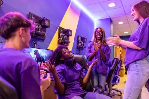 gamers-celebrating-victory-in-internet-cafe-with-n-2025-02-22-01-11-37-utc.jpg